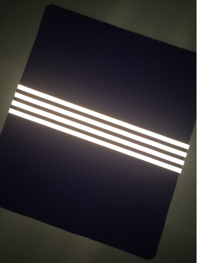 SEML005製作反光效果無縫熱帖款式   訂做無縫熱帖款式 高亮熱貼反光膠條   設計無縫熱帖款式  無縫熱帖廠房 側面照